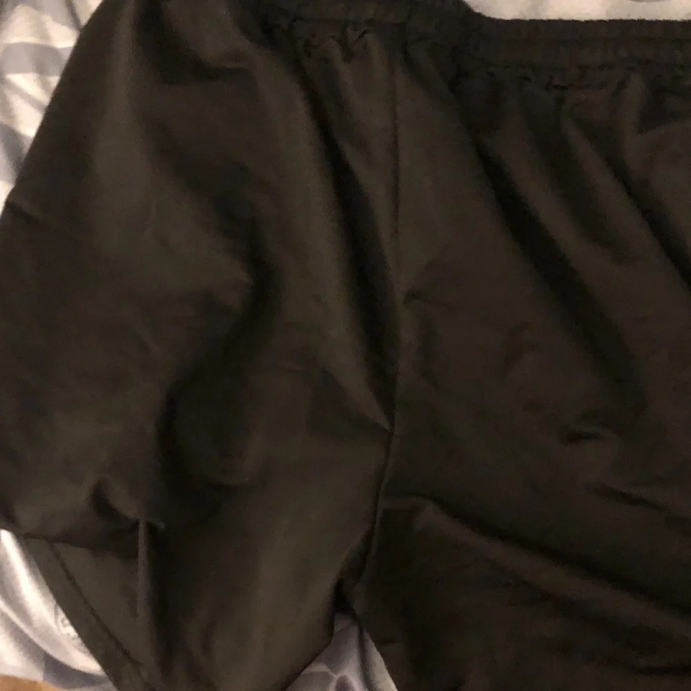 Black Drawstring Shorts with Cartoon Duck Graphic